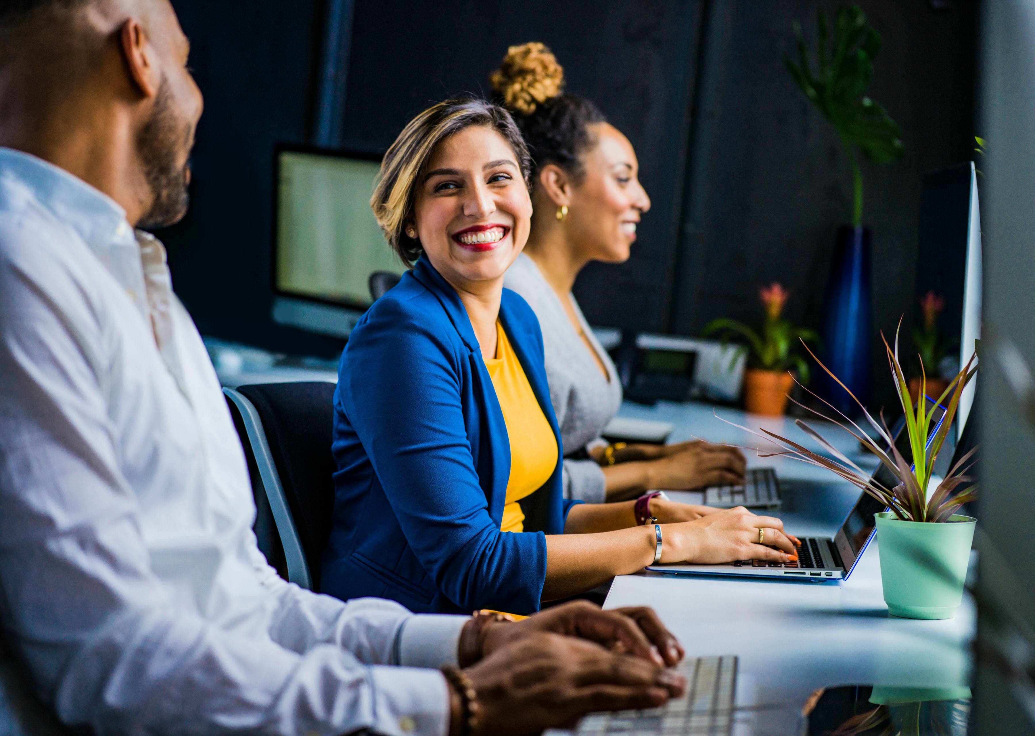 Diverse team collaborating in a modern office setting